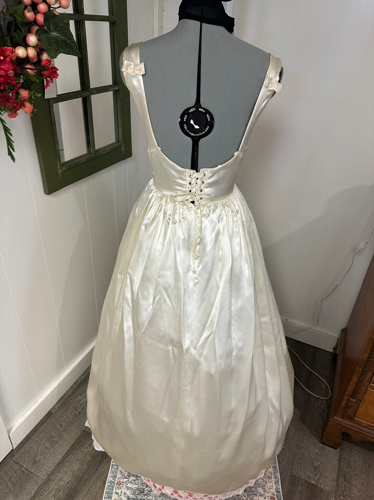 Fifer is a unique reworked ivory wedding dress of satin