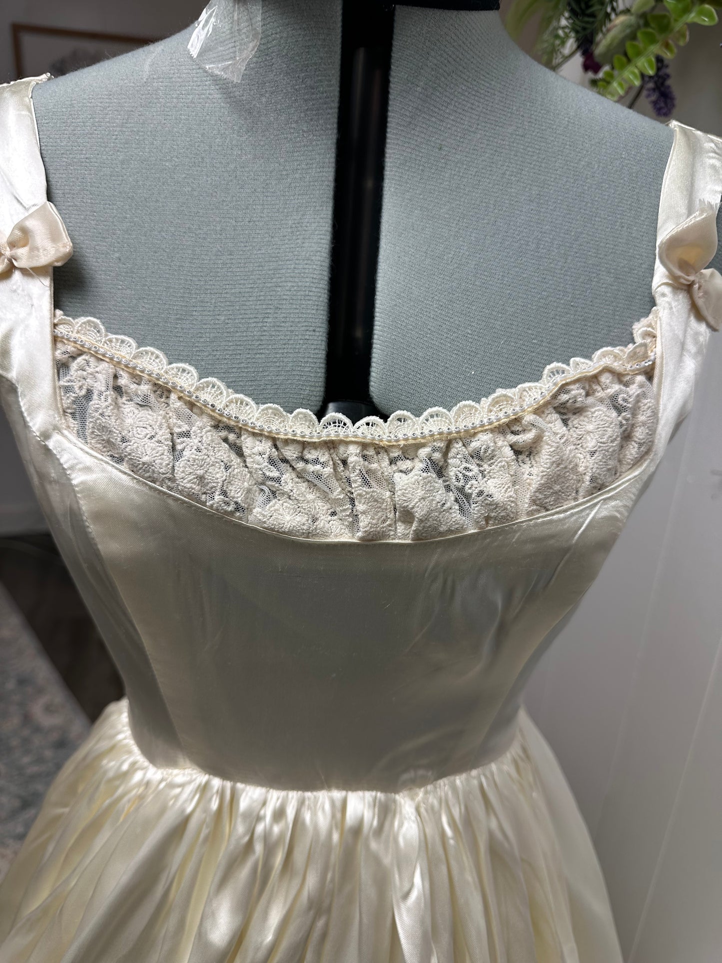 Fifer is a unique reworked ivory wedding dress of satin