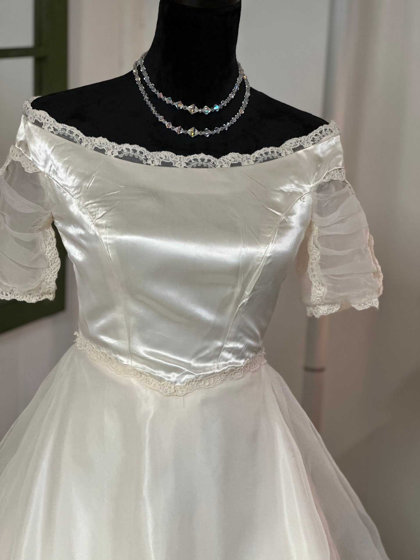 Gigi Is a classic vintage ivory wedding dress from 1960's