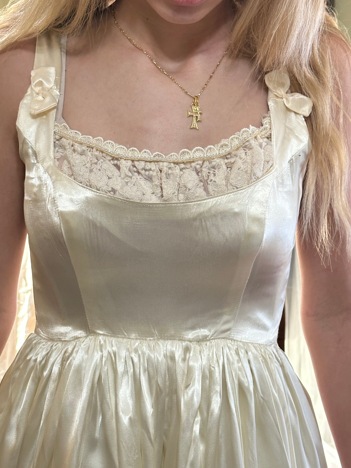 Fifer is a unique reworked ivory wedding dress of satin