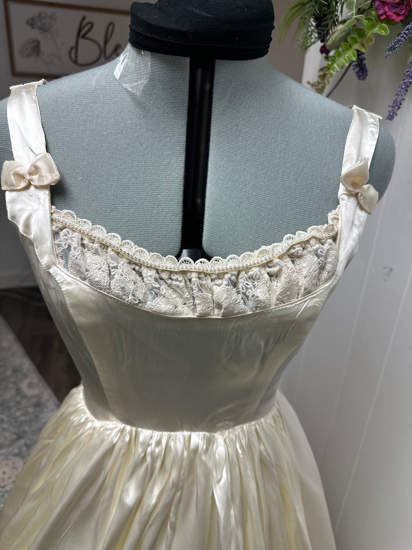 Fifer is a unique reworked ivory wedding dress of satin