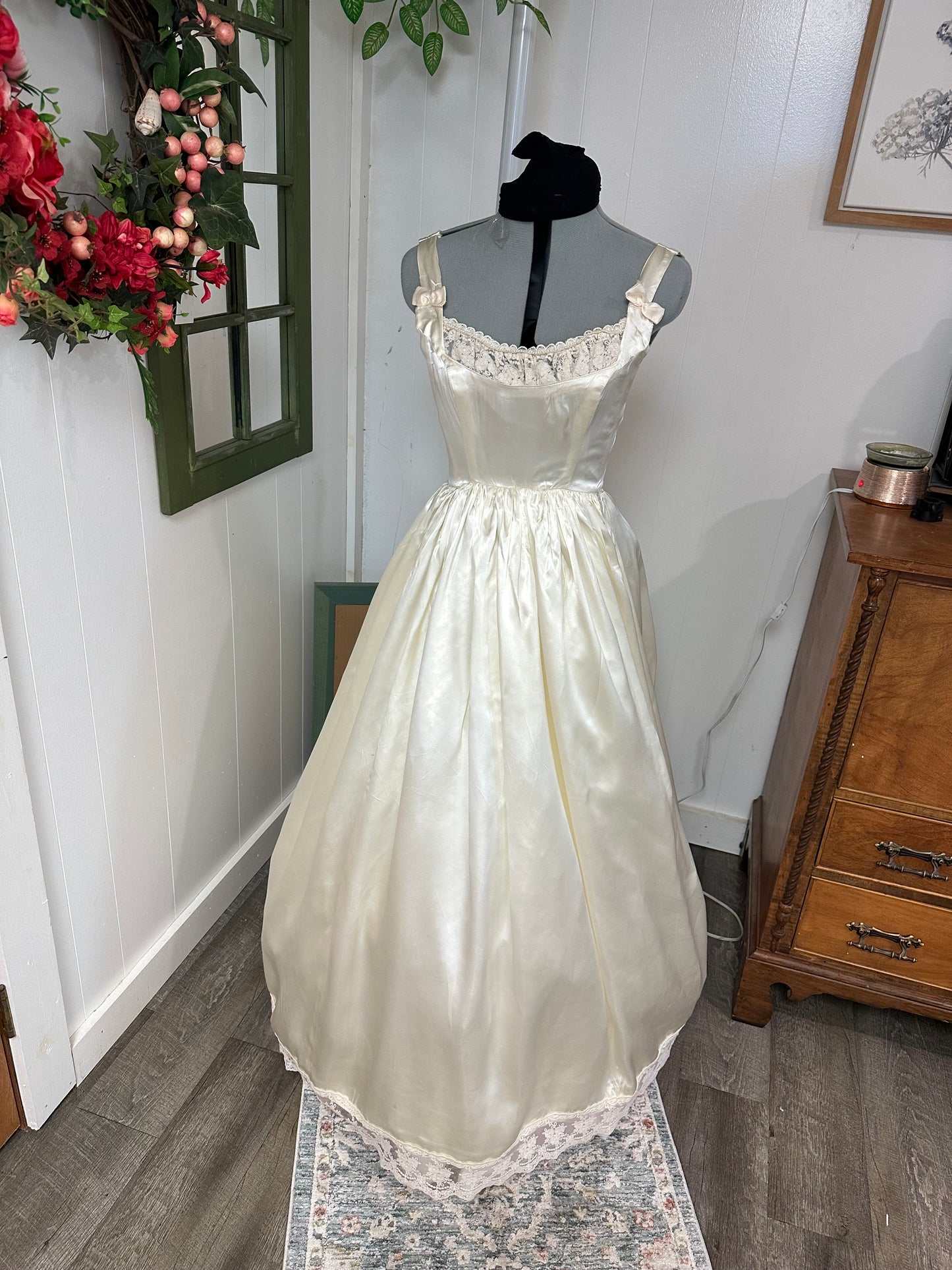 Fifer is a unique reworked ivory wedding dress of satin