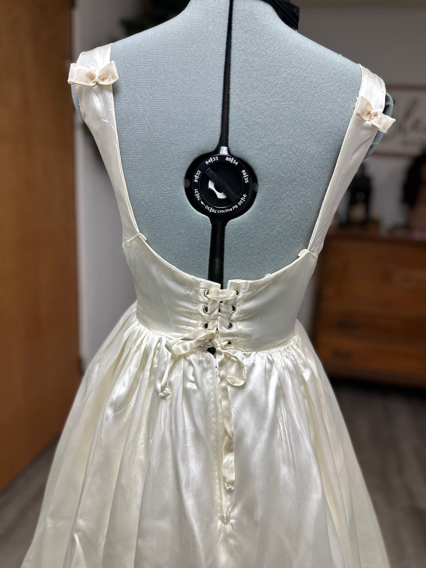 Fifer is a unique reworked ivory wedding dress of satin