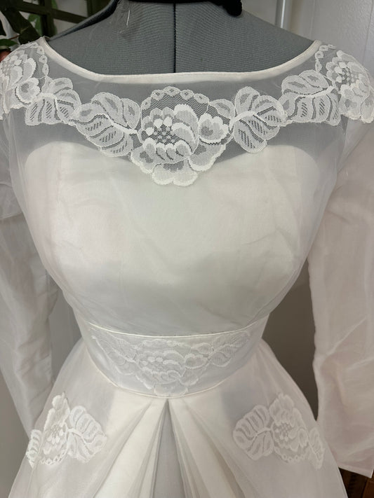 Jolene is a vintage 1960s or earlier dead stock wedding dress