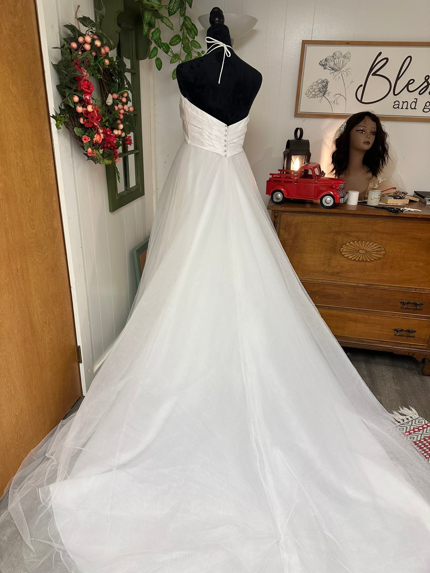 Eden is a brand new never worn wedding dress by Eden Bridals