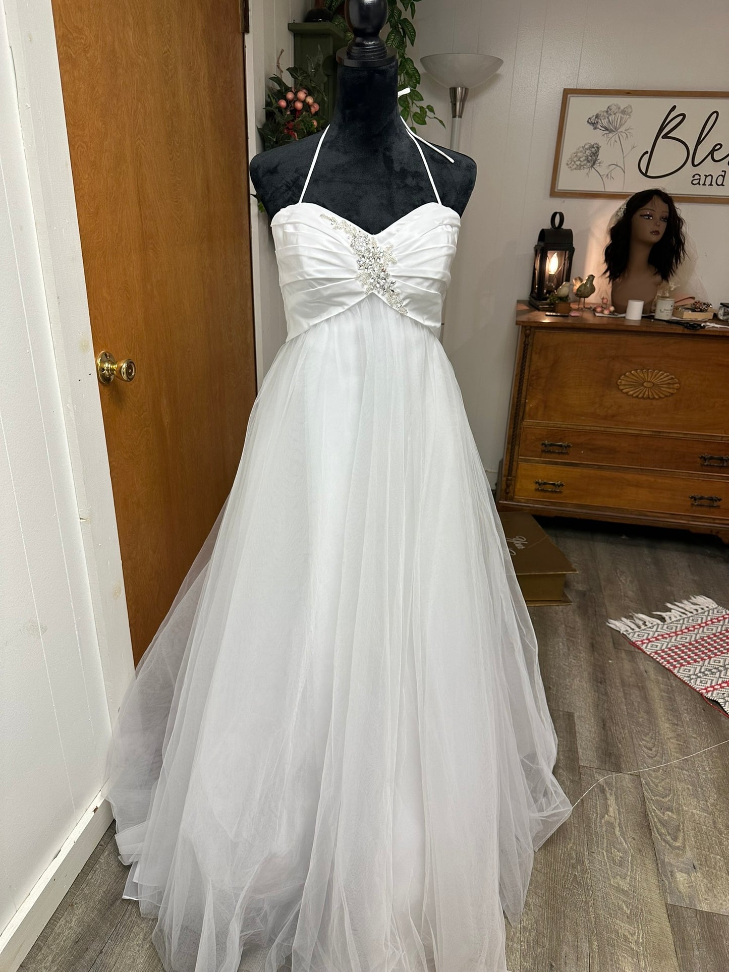 Eden is a brand new never worn wedding dress by Eden Bridals