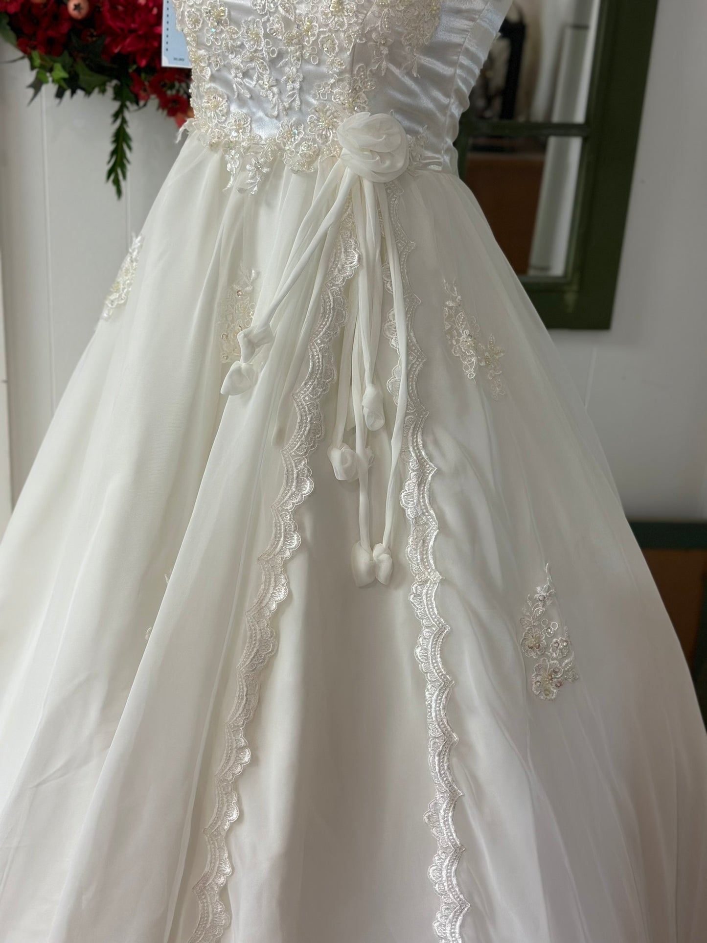 Tabby is a vintage ivory wedding dress decade unknown.