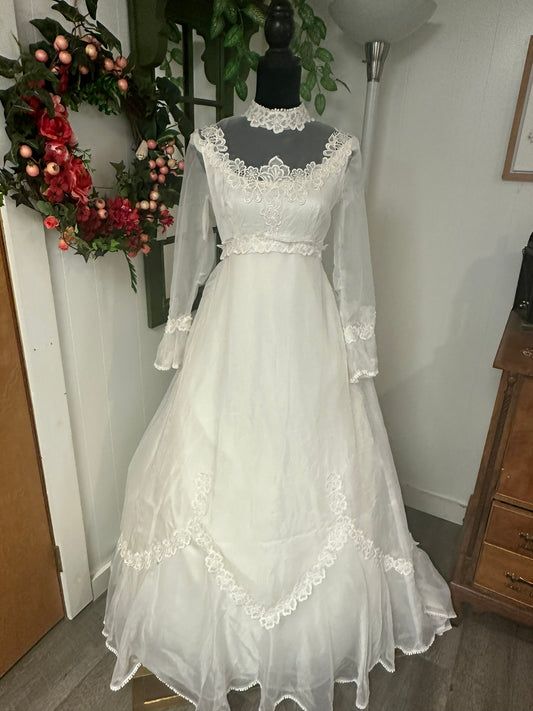 Jaclyn is a classic 1970s Victorian style wedding gown